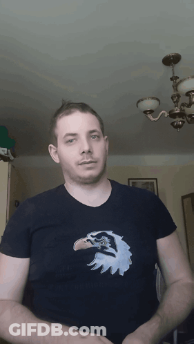 Man In Black Shirt With Eagle GIF