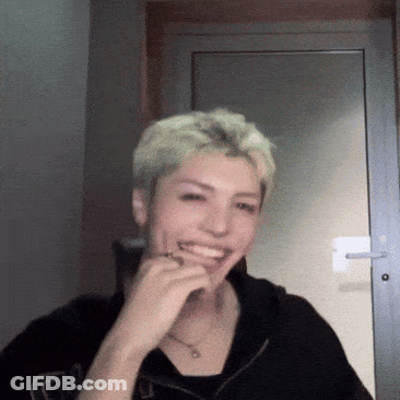 Man In Black Shirt With G Laughing GIF
