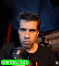 Man In Black Shirt With Green Tommy Tallarico Sticker GIF