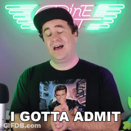 Man In Black Shirt With Gun Picture Saying I Gotta Admit GIF