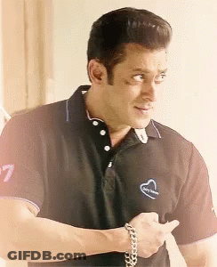 Man In Black Shirt With Heart GIF