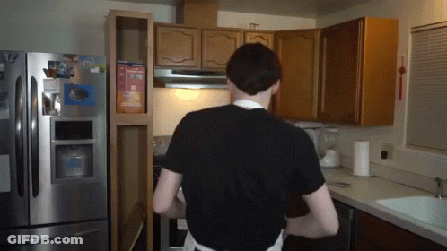 Man In Black Shirt With Kraft Mac And Cheese On Fridge GIF
