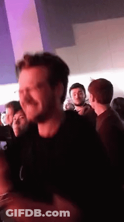 Man In Black Shirt With Letter C GIF
