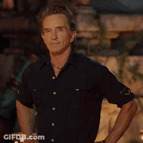 Man In Black Shirt With Letter C On Sleeves GIF