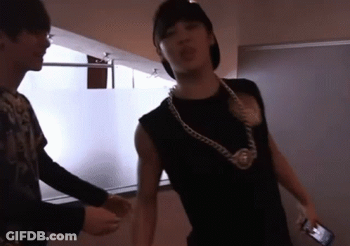 Man In Black Shirt With Neck Chain GIF