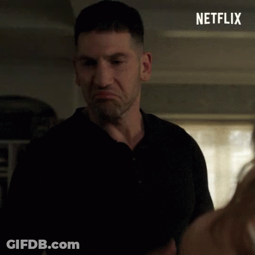 Man In Black Shirt With Netflix Logo GIF