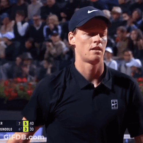 Man In Black Shirt With Nike Logo On Sleeve GIF