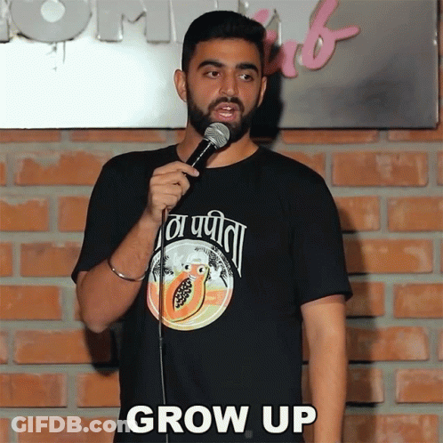 Man In Black Shirt With Papaya Says Grow Up GIF