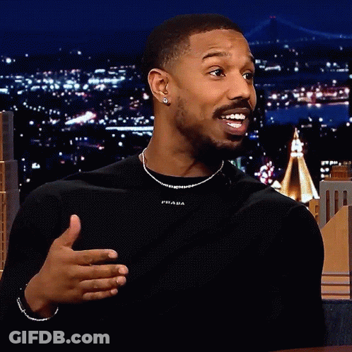 Man In Black Shirt With Prada GIF