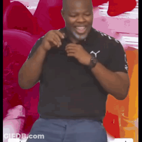 Man In Black Shirt With Puma Logo GIF