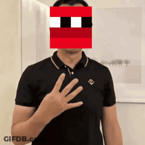 Man In Black Shirt With Red Pixelated Face Behind Him GIF