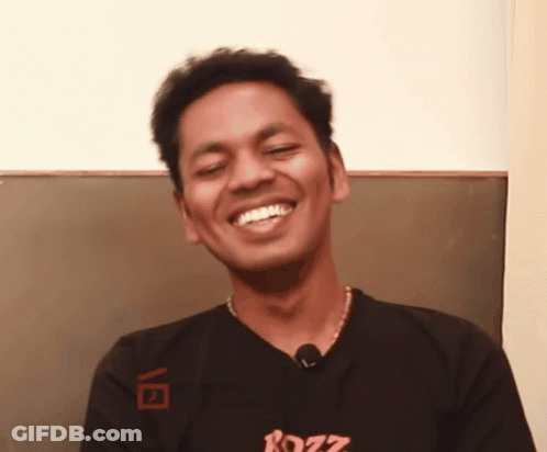Man In Black Shirt With Rozz Smiling GIF