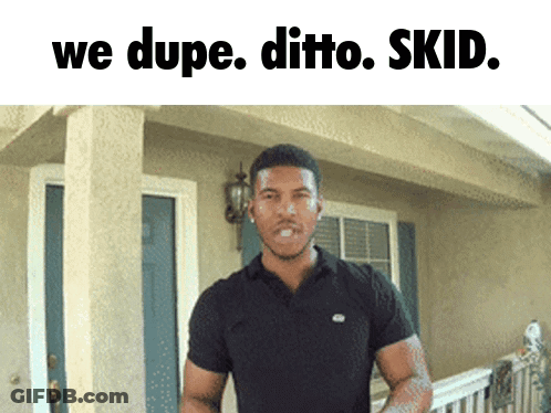 Man In Black Shirt With We Dupe Ditto Skid Above Him GIF