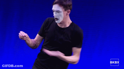 Man In Black Shirt With White Face Paint GIF