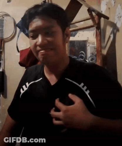 Man In Black Shirt With White Stripe GIF
