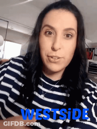 Man In Black Skull Shirt Serving Food To Woman GIF