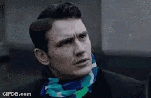 Man In Black Suit And Blue Scarf GIF