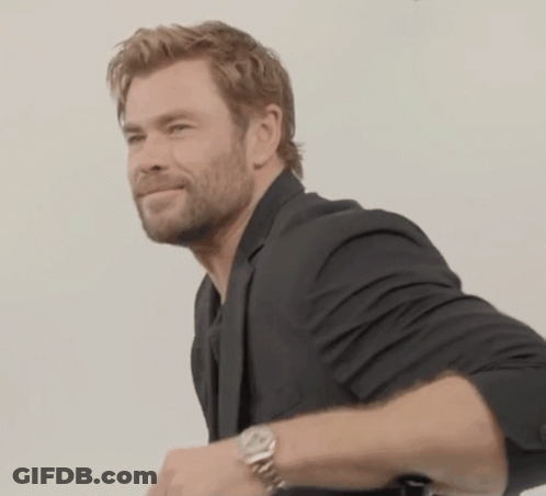Man In Black Suit And Silver Watch GIF