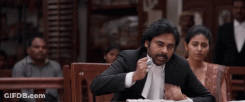 Man In Black Suit And White Shirt GIF