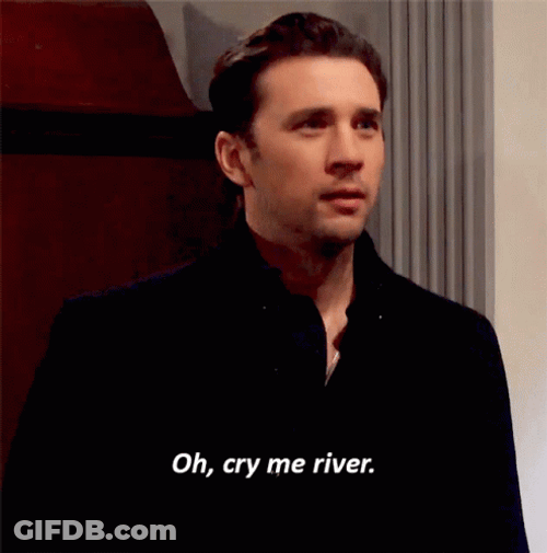 Man In Black Suit Cry Me A River GIF