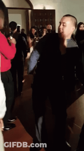 Man In Black Suit Dancing GIF