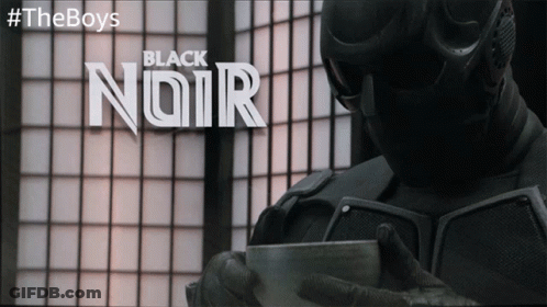 Man In Black Suit Holding Cup With Black Noir GIF