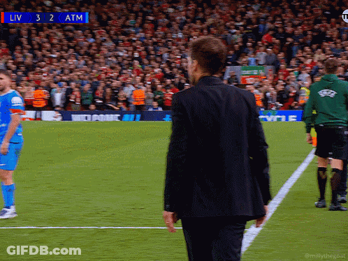 Man In Black Suit On Soccer Field With Scoreboard Liv 3 2 Atm GIF