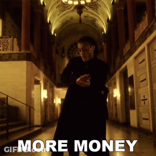 Man In Black Suit Saying More Money GIF