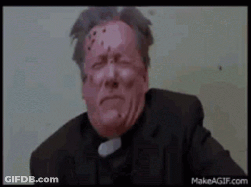 Man In Black Suit Sitting On Toilet GIF