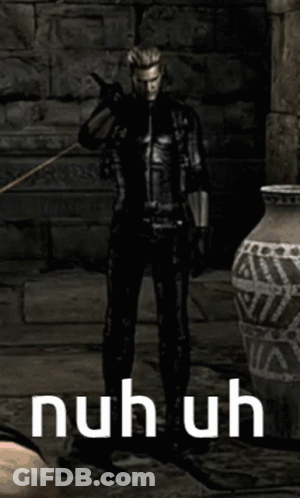 Man In Black Suit Standing By Vase Saying Nuhuh GIF