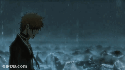 Man In Black Suit Standing In Rain With Blood GIF