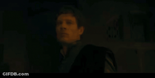 Man In Black Suit Standing GIF