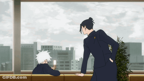 Man In Black Suit Standing Next To Another Man GIF