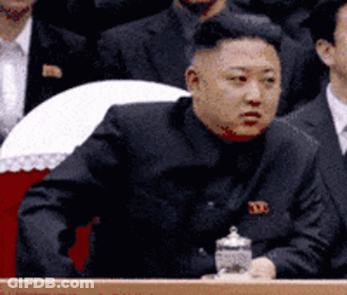 Man In Black Suit With TD Badge GIF