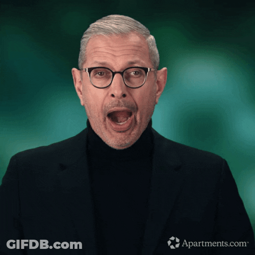 Man In Black Suit Yawning GIF