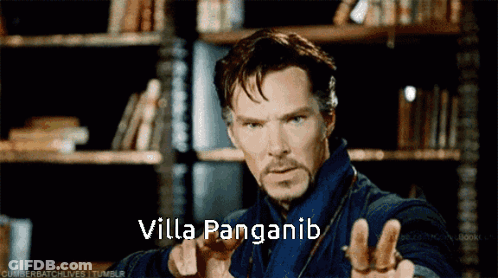 Man In Black Superhero Costume At Computer GIF