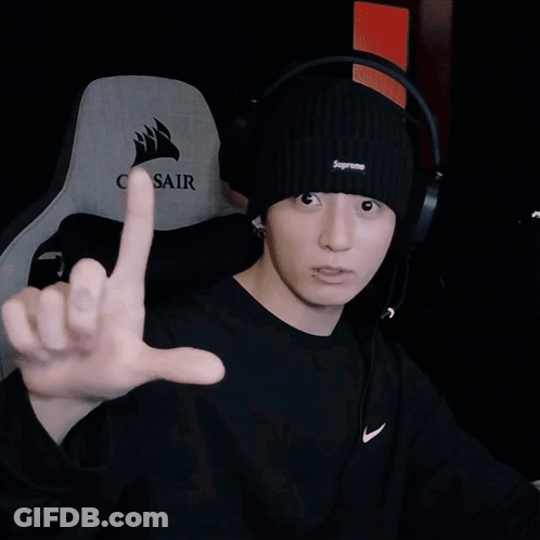 Man In Black Supreme Beanie Pointing At Camera GIF
