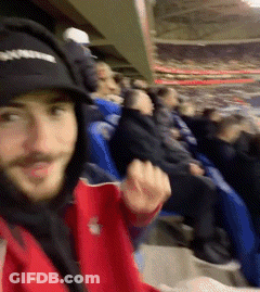 Man In Black Supreme Hat At Stadium GIF