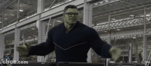 Man In Black Sweater And Glasses In Factory GIF