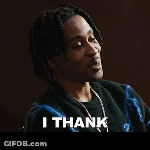 Man In Black Sweater And Necklace Saying Thank You GIF