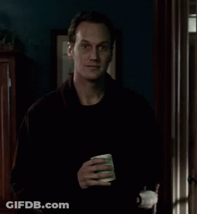 Man In Black Sweater Holding Coffee Cup GIF