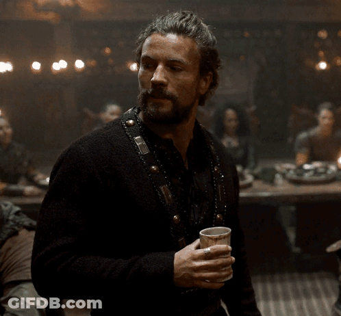 Man In Black Sweater Holding Cup GIF
