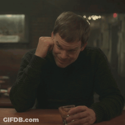 Man In Black Sweater Holding Whiskey Saying Yeah Okay GIF