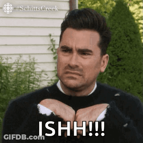 Man In Black Sweater Making Funny Face GIF