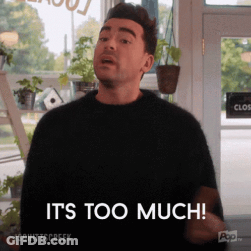 Man In Black Sweater Says It's Too Much GIF