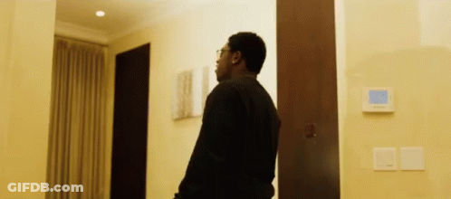 Man In Black Sweater Standing GIF