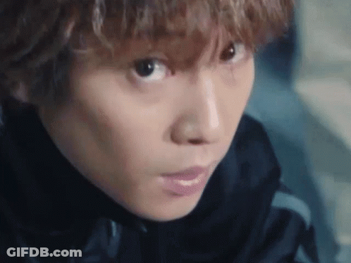 Man In Black Sweater With Letter K3 GIF