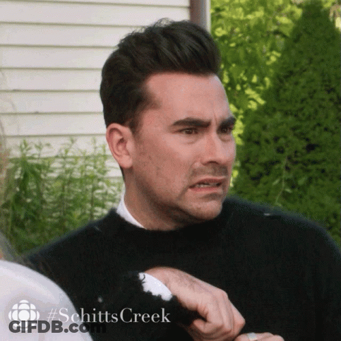 Man In Black Sweater With Schitt's Creek GIF