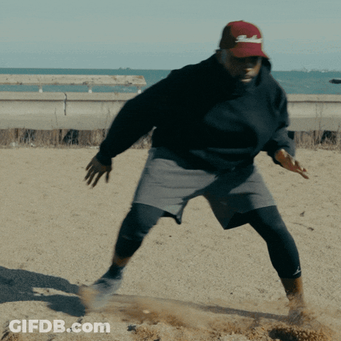 Man In Black Sweatshirt And Red SD Hat GIF