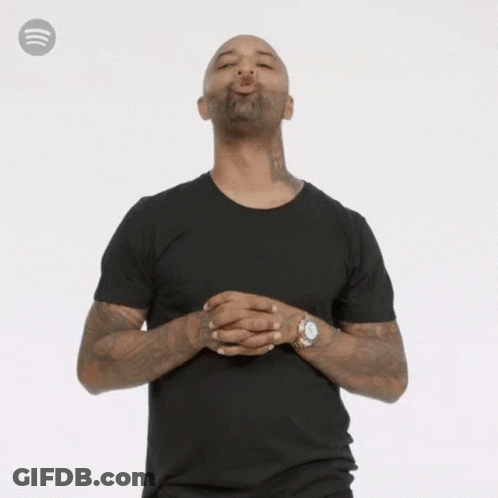 Man In Black T-Shirt And Watch Blowing Kiss GIF